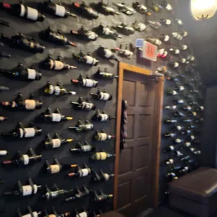 a wall of wine bottles