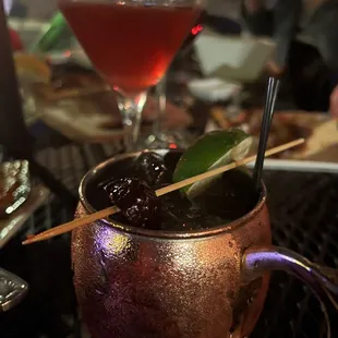 a cocktail in a copper mug