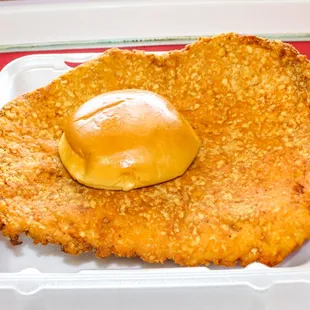 a piece of fried bread with a scoop of butter on top