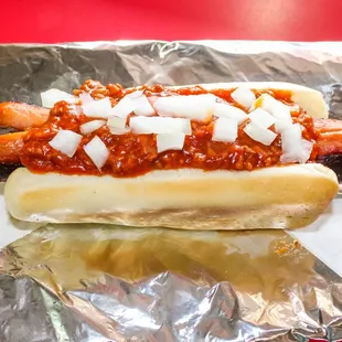 a chili dog with onions