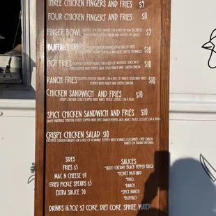 a menu on a food truck