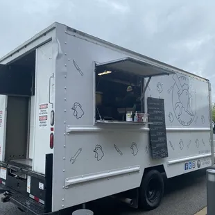 a food truck parked in a parking lot