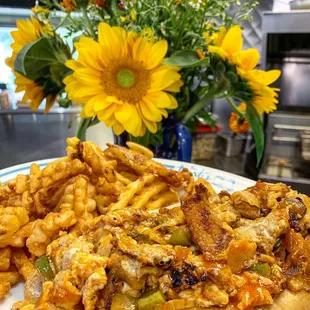 Buffalo chikn cheesesteak with waffle fries