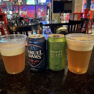 three beers and a can of beer