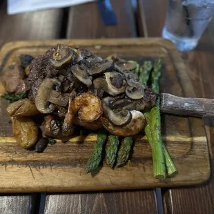 Steak w fingerling potatoes/asparagus. Added shrimp + mushrooms.