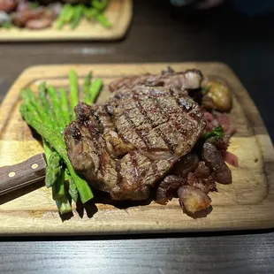 Steak, med rare- fingerling potatoes and asparagus- cooked perfect! They have a tasty steak sauce too that I tried!