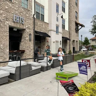 two people sitting on the patio