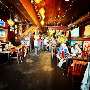 a group of people sitting at tables