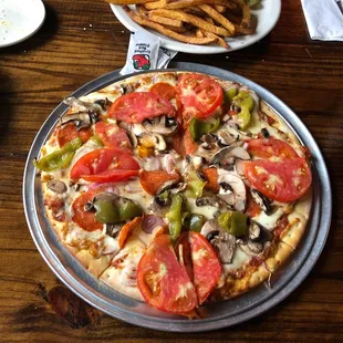 Bigggg pizzas $14 veggie plus pepperoni