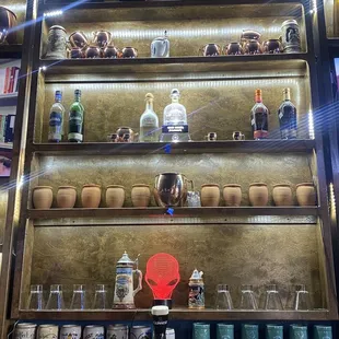 a shelf full of beer