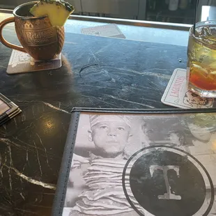 Old fashioned and pineapple special cocktail.