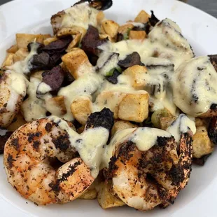 Shrimp, potato and chorizo dish