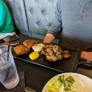 Fish fry platter with garlic potatoes.