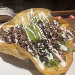 a taco dish on a plate