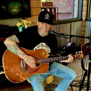 a man playing guitar