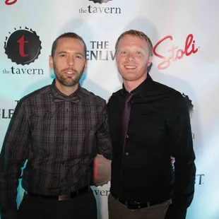 two men posing for a picture