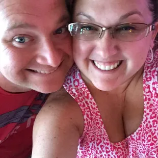 a man and a woman taking a selfie