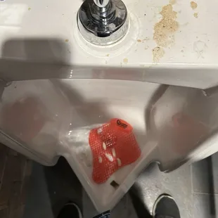 Projectile vomit in the mens room from the night before. Disgusting.