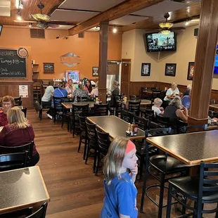 My niece leads the way into one of the dining areas-September 2023
