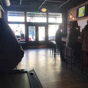 people sitting at the bar