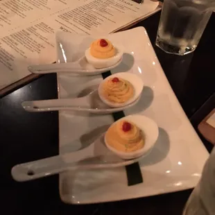 Sriracha deviled eggs, 3 for 5$. Not as creamy as others I&apos;ve had but still very good!