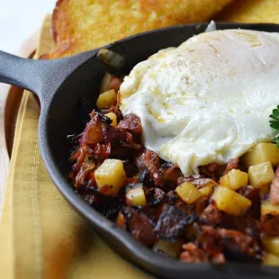 a skillet with a fried egg on top
