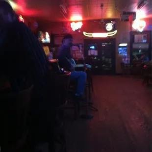 a man sitting at a bar