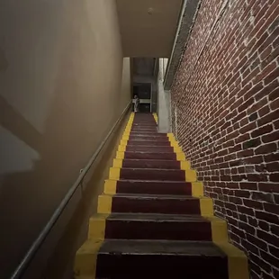 a brick wall and stairs