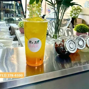 a glass of iced tea on a table