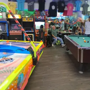 a pool table and arcade