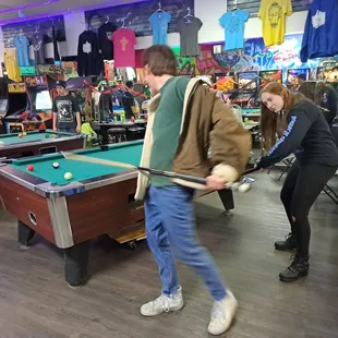 a man playing pool