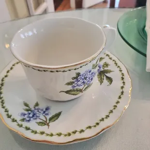 a tea cup and saucer