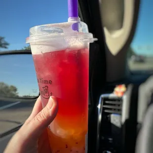 Custom creation. Passionfruit green tea, with popping boba.