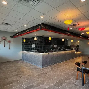 a restaurant with tables and chairs