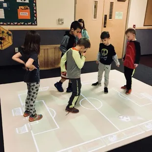 Our interactive video game in our indoor gym is a hit for every age. The schoolagers love the soccer game best.