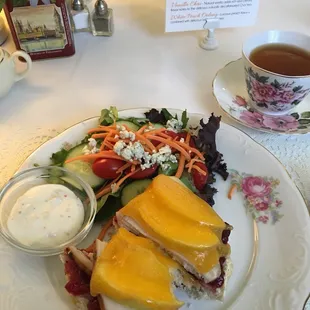 a plate of food and a cup of tea