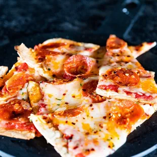 a plate of pizza on a table