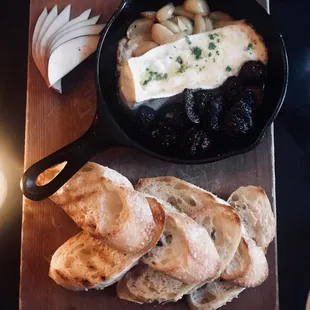 Warm brie, spreadable roasted garlic, warm grilled baguette and more... amazing!