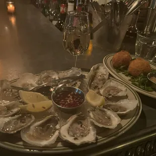 Oysters and ham and cheese croquetas