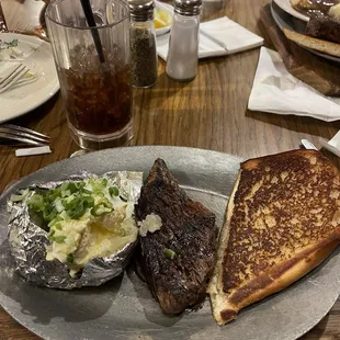 Steak and baked Potato delicious.