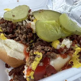 Tendermaid Dog = Hormel beef dog + Tendermaid loose meat burger + bacon + pickles + ketchup + mustard