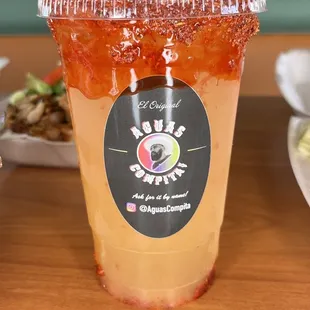 a drink in a plastic cup