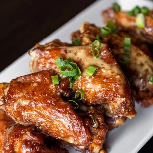 a plate of chicken wings