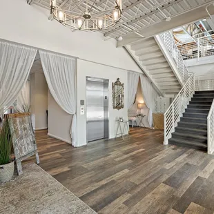 Foyer with elevator and stair case