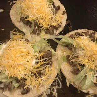 3 Steak Tacos with corn tortilla, lettuce, cream, and cheese