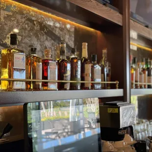 a variety of liquor bottles