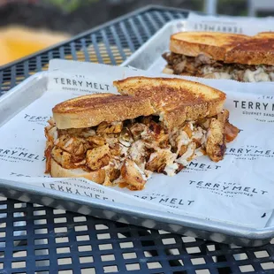 Chicken patty melt, steak in the back