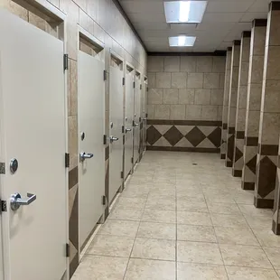 a row of restroom stalls