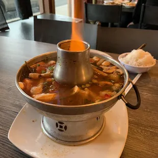 Sour Seafood Soup (32oz)  and Steam Rice