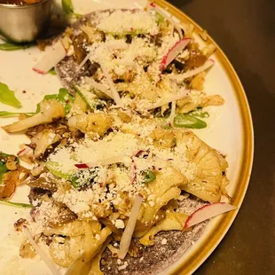 Three tacos with the Cauliflower Taco appetizer